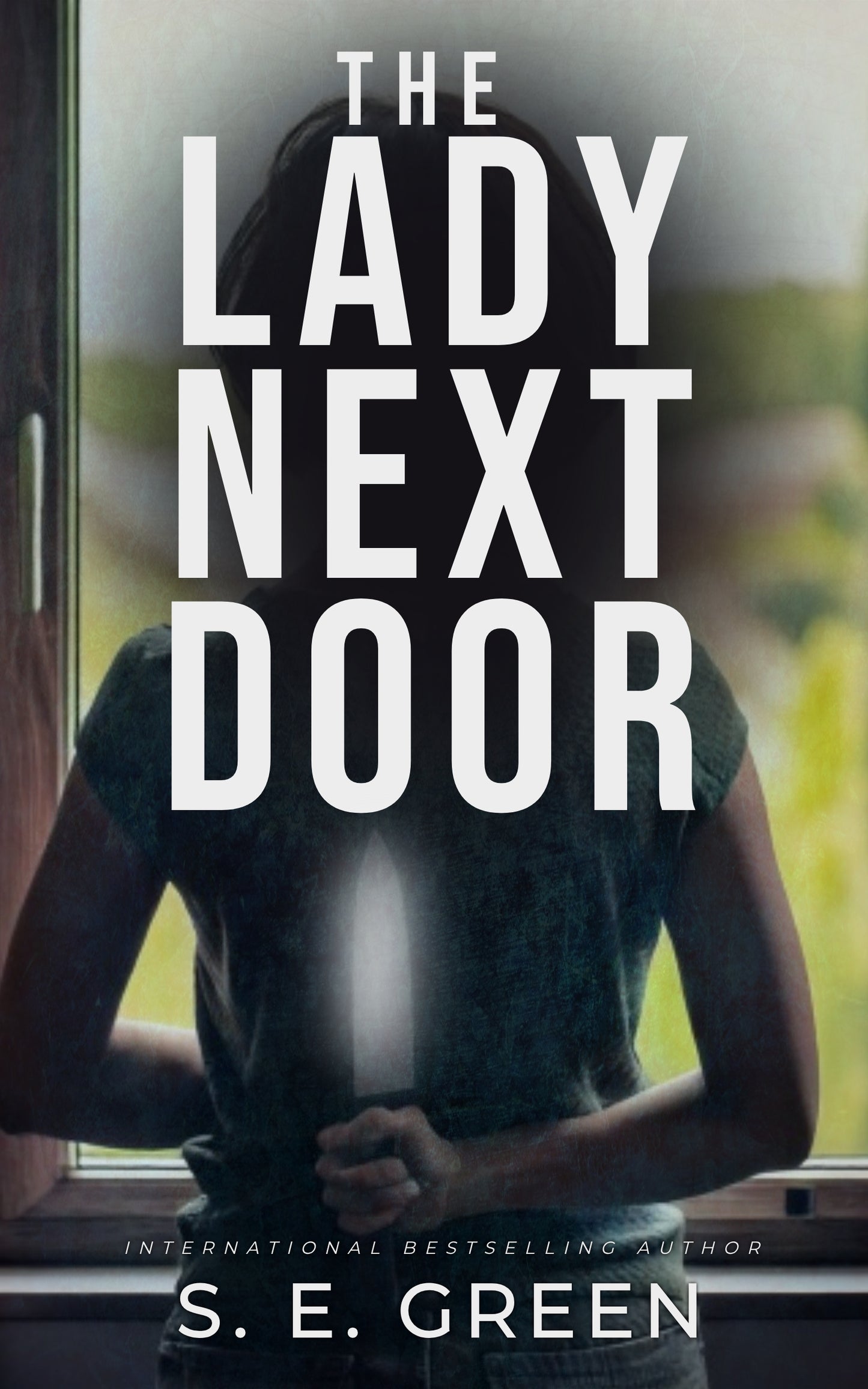 The Lady Next Door by S.E. Green
